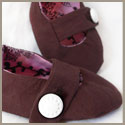 Brown baby booties with snap closure